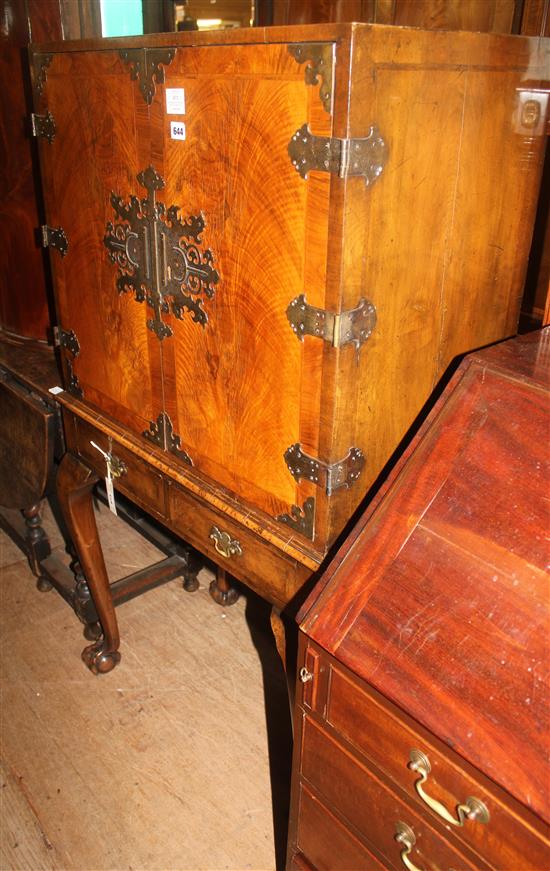 Queen Anne style walnut cocktail cabinet on ball & claw feet